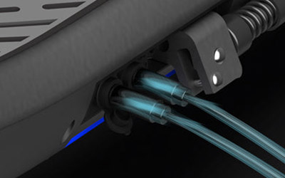 Close-up image of Electric scooter Inmotion S1 double charging ports and charger cables.