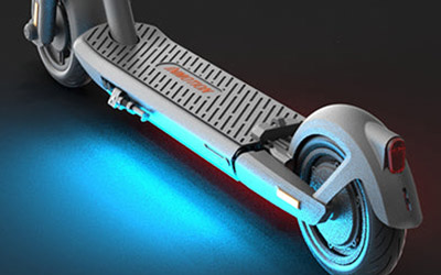 Close-up image of Electric scooter Inmotion S1 automatic turn lights shining.