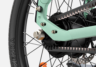 Close-up of rear wheel and drivetrain of mint green Engwe P20 electric bike