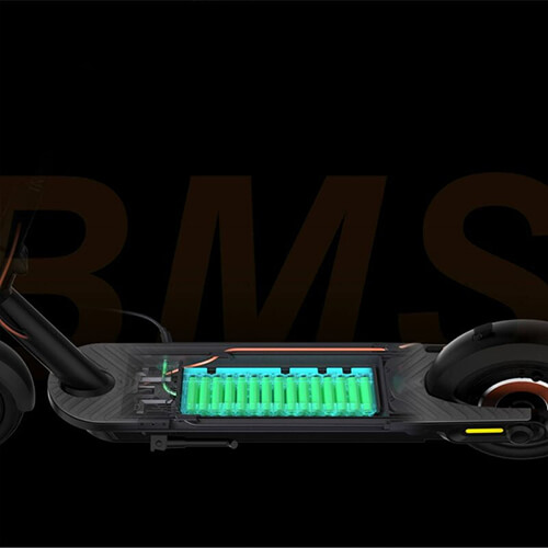 Side view of the Inmotion Climber electric scooter with a transparent deck revealing battery cells inside, illustrating the internal battery management system (BMS) on a dark background.