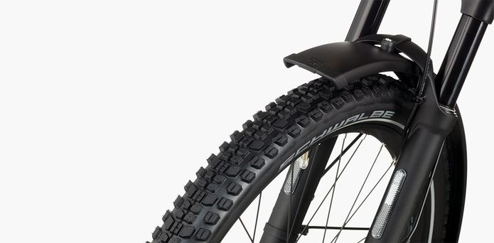 Close-up of Riese & Müller Nevo 4 electric bike front tire with Schwalbe tread and fender