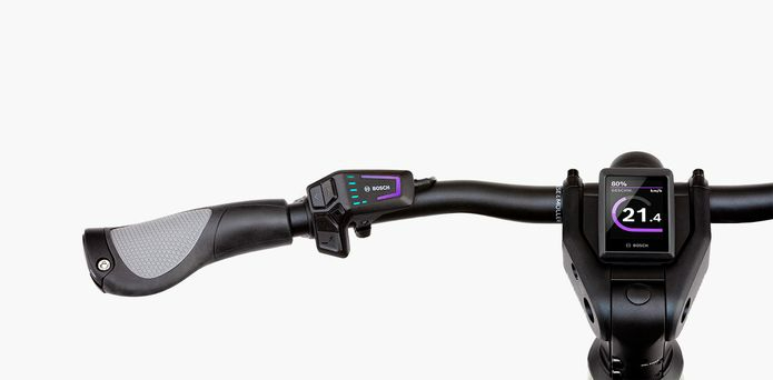 Close-up of Riese & Müller Nevo 4 electric bike handlebar featuring Bosch display