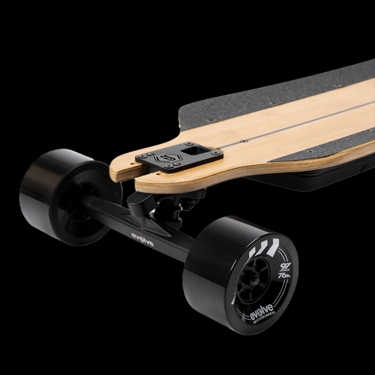 Front wheel close-up of Evolve GTR 2 Carbon All Terrain electric skateboard featuring off-road tire and truck design