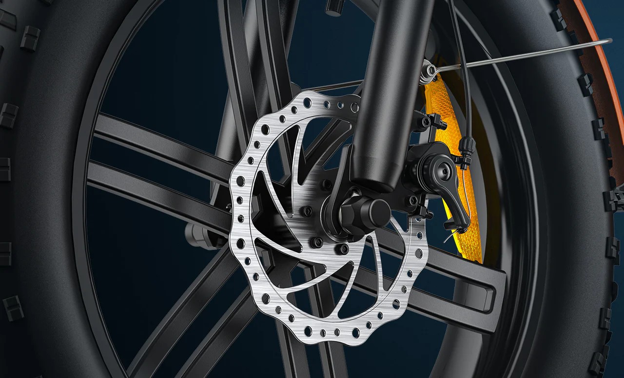Close-up of the orange Engwe EP-2 Boost electric bicycle's disc brakes.