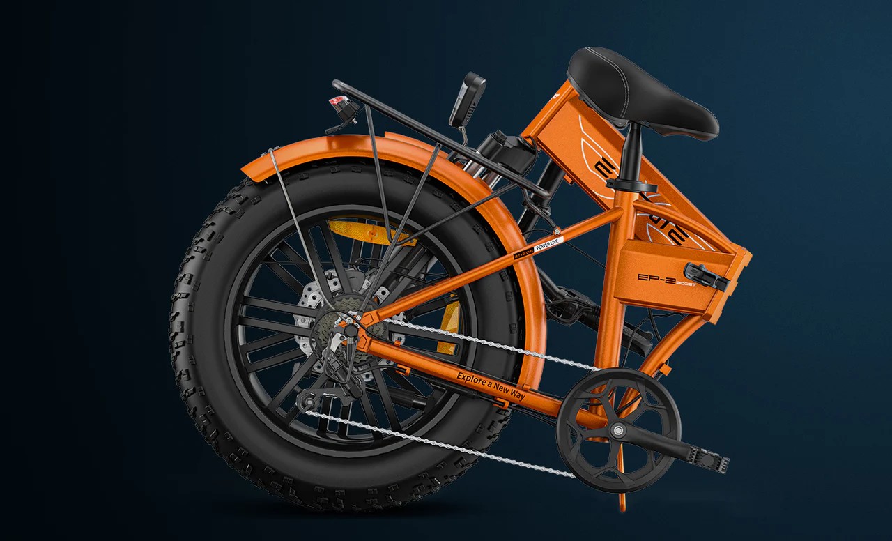 Side view of the folded orange Engwe EP-2 Boost electric bicycle's demonstrating the bike's foldability.