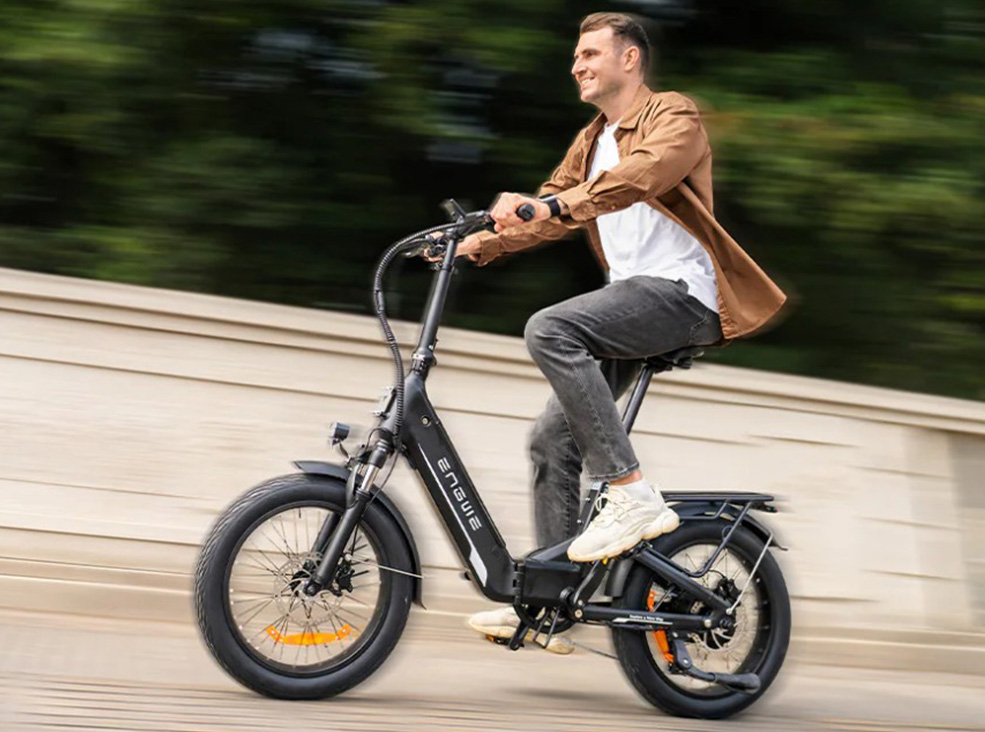 Man riding on the Engwe L20 3.0 Boost electric bicycle demonstrating the 75Nm torque power.