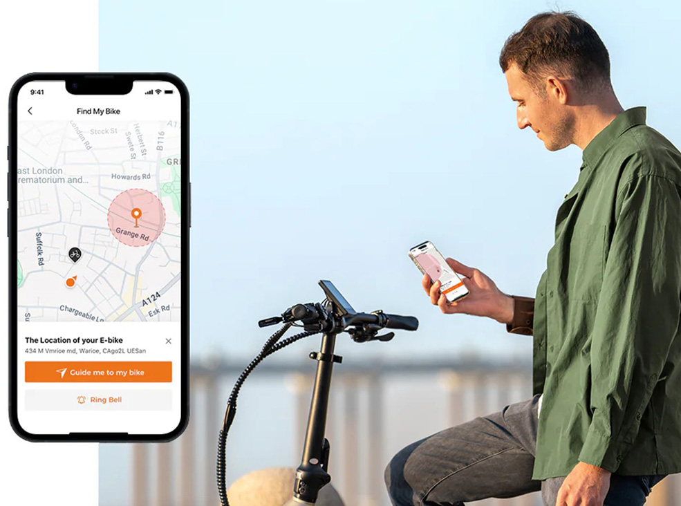 A man sitting on the Engwe L20 3.0 Pro electric bicycle and looking at the Engwe app's GPS feature.