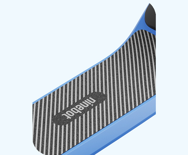 Close-up of the Segway-Ninebot C2 Lite Kids electric scooter's footboard.