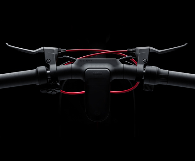 Close-up of the Segway-Ninebot MAX G3 electric scooter's handlebar.