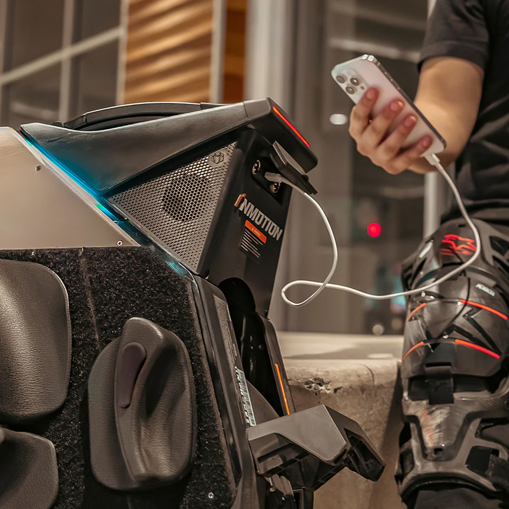 Close-up image of the Inmotion V12S electric unicycle's portable charging.