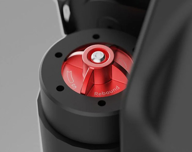 Close-up image of the Kingsong F22 Pro electric unicycle's adjustable suspension system.